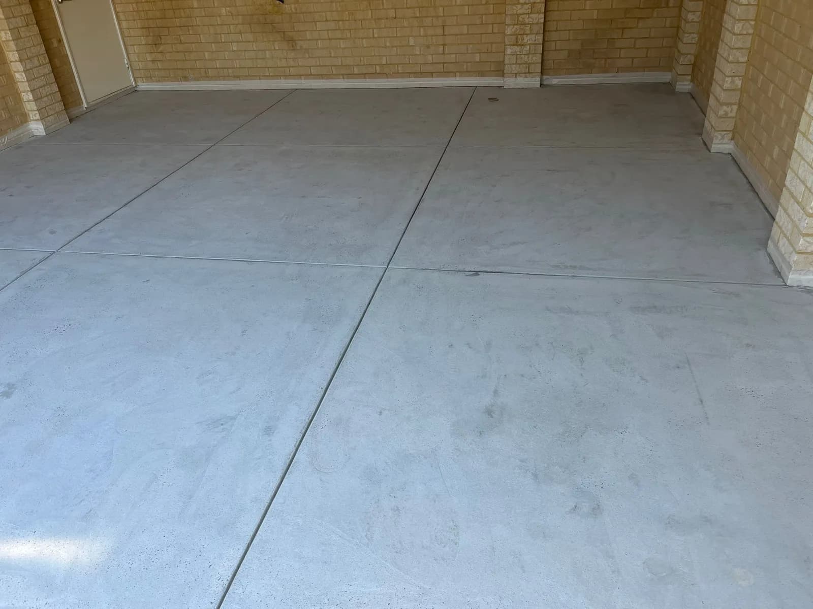 Garage concrete slab after diamond grinding, cleaned and profiled ready for coating in Perth