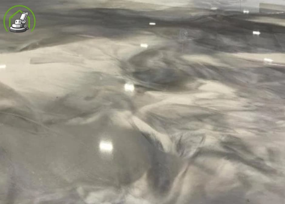 High-gloss metallic epoxy floor in a Wanneroo living space with marbled effect