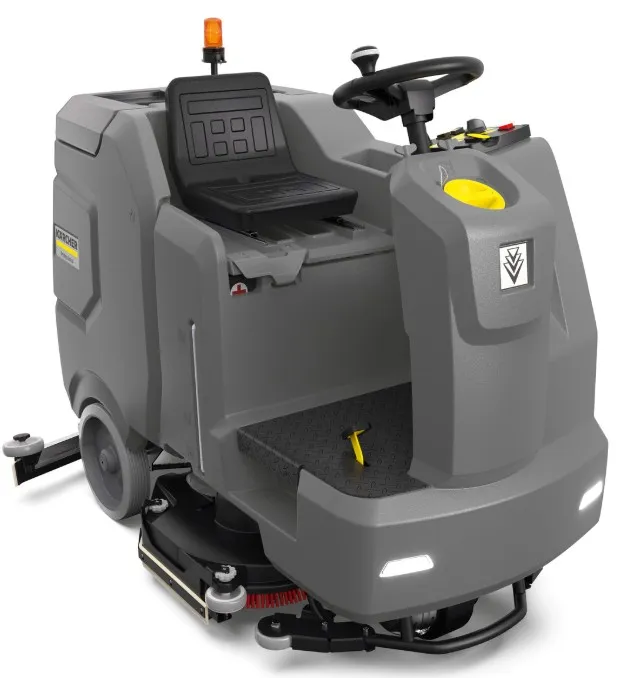 Industrial auto scrubber cleaning a warehouse concrete floor in Perth